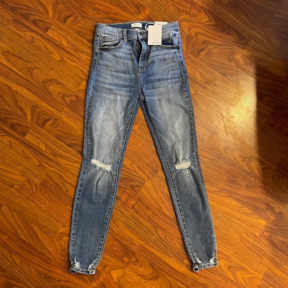 Sneak Peek High Rise Skinny Jeans